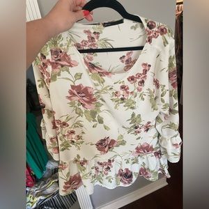 Gibson cream color 3/4 sleeve blouse with muted florals and ruffle detail